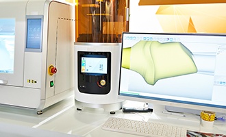 a dental milling machine and computer